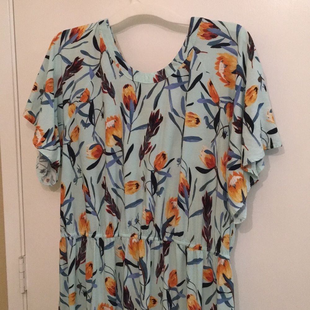 Spring sun dress. Flowery and loose. Asymmetrical